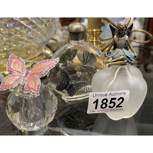 1852 - 3 nice perfume bottles featuring butterfly & fairy design