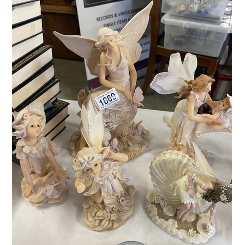 1869 - 5 fairy figurines including fairy with Nautilus shell