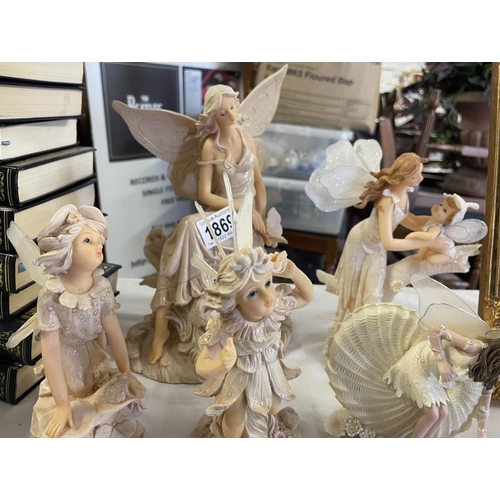 1869 - 5 fairy figurines including fairy with Nautilus shell