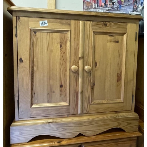 1894 - A small pine two door cabinet, COLLECT ONLY.