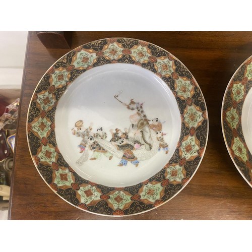 1787 - A pair of Japanese Satsuma plates with hand painted decoration and a Kutani plate.