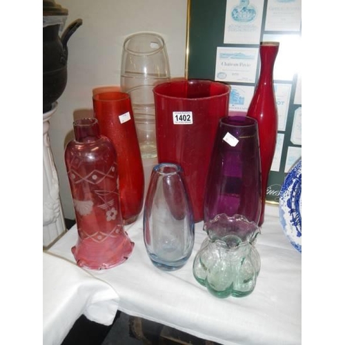 1402 - A mixed lot of coloured and clear glass vases, COLLECT ONLY.