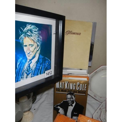 1412 - A quantity of music and acting related books and a picture of Rod Stewart.