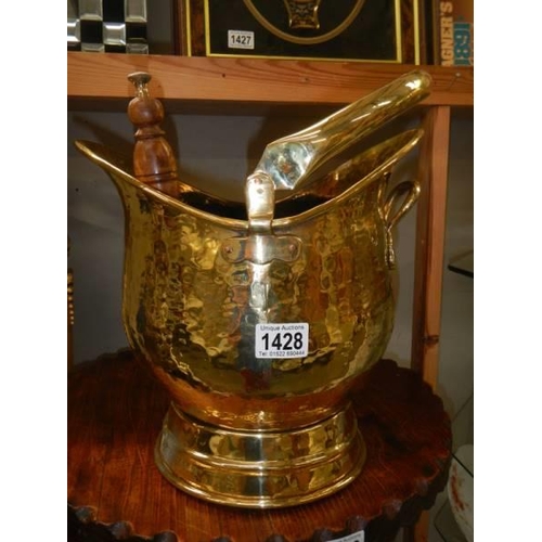 1428 - A brass coal scuttle with shovel. COLLECT ONLY.