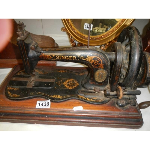 1430 - A vintage Singer sewing machine (no cover) COLLECT ONLY.