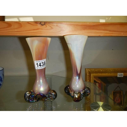 1438 - A pair of  coloured glass vases.