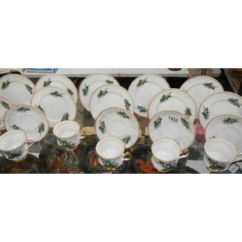 1455 - A bone china tea set decorated with lily of the valley. COLLECT ONLY.