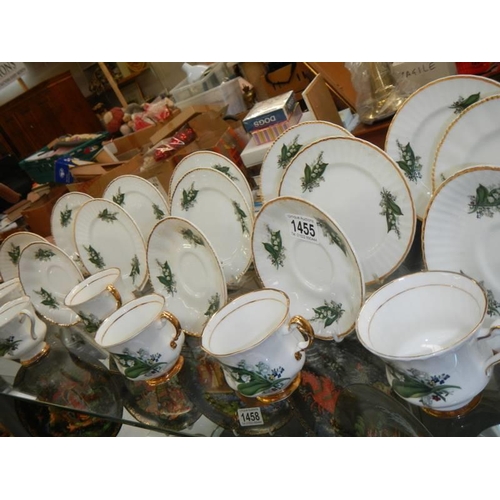 1455 - A bone china tea set decorated with lily of the valley. COLLECT ONLY.