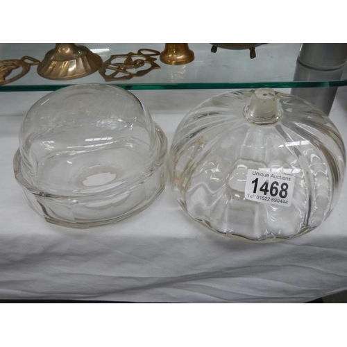 1468 - Two glass oil lamp fonts.