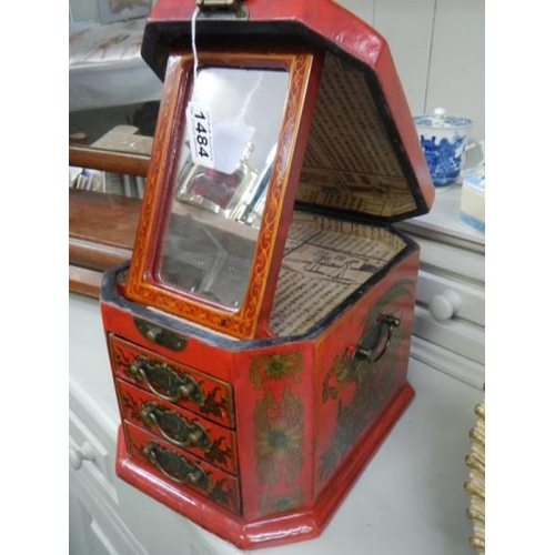 1484 - A 20th century copy of a Japanese red lacquered jewellery case hand painted with birds.