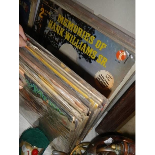 1516 - A quantity of Hank Williams LP records. (25)