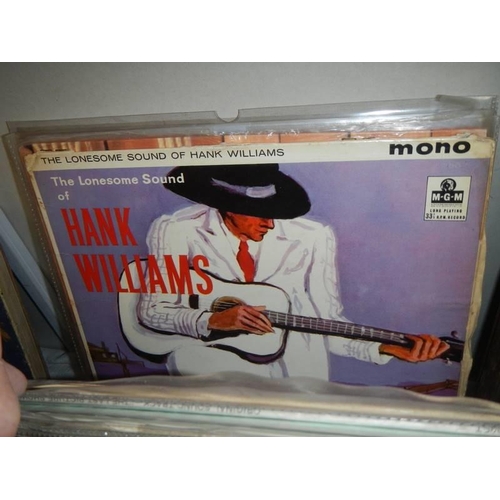 1516 - A quantity of Hank Williams LP records. (25)