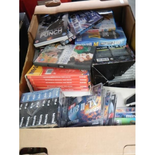 1544 - Two boxes of assorted DVD's, magazines etc.,