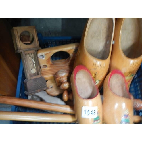 1548 - A box of wooden items including clogs.