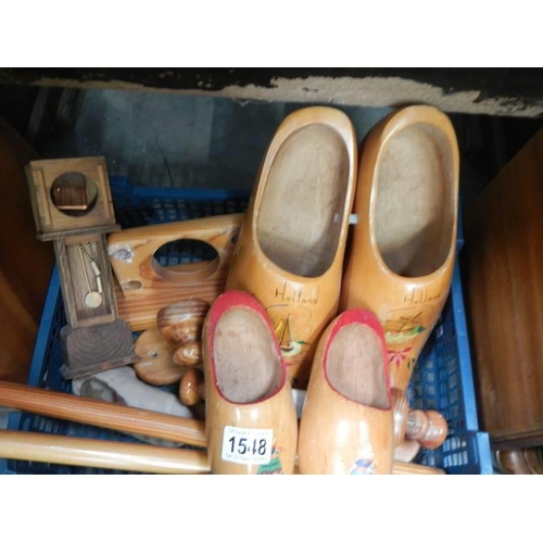 1548 - A box of wooden items including clogs.