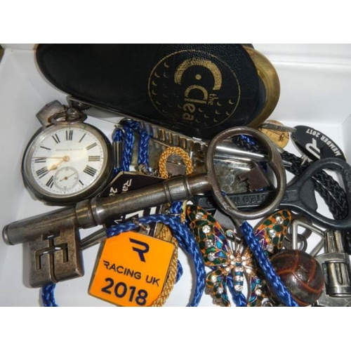 1567 - A mixed lot of interesting items including a silver pocket watch and an antique key.