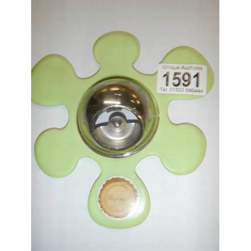 1591 - A retro magnetic bottle opener.