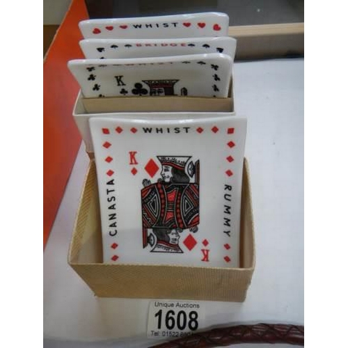 1608 - A set of four 'Whist' playing card pin dishes.