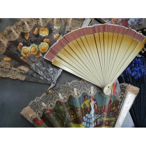 1610 - A collection of vintage fans.