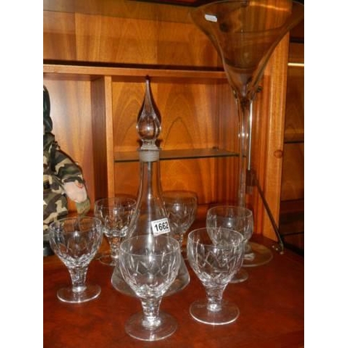 1662 - A glass decanter and six glasses.