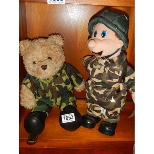 1663 - A Teddy bear and a doll dressed in combat gear.