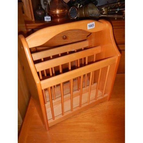 1665 - A good pine magazine rack. COLLECT ONLY