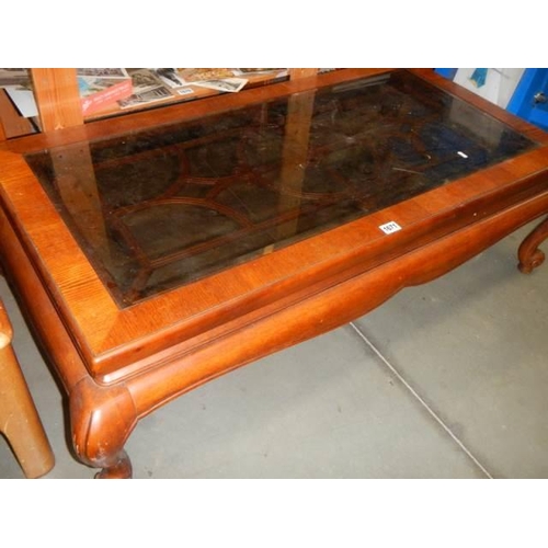 1671 - A mahogany coffee table on cabriole legs and with glass top. COLLECT ONLY.