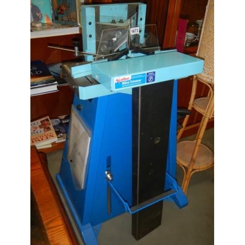 1673 - A top quality mitre trimmer machine, COLLECT ONLY.