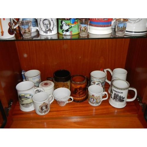 1676 - Three shelves of tankards and mugs including advertising, COLLECT ONLY.