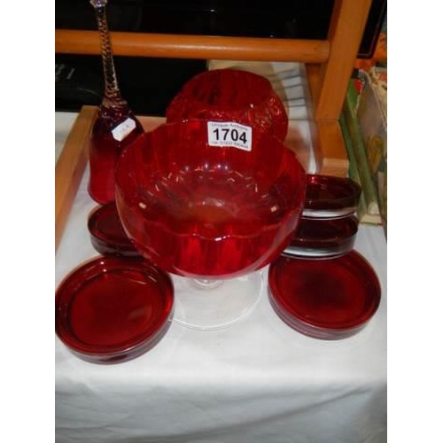 1704 - A mixed lot of red glass ware.