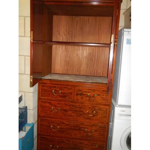 1717 - A good quality two door cupboard on drawer base. COLLECT ONLY.