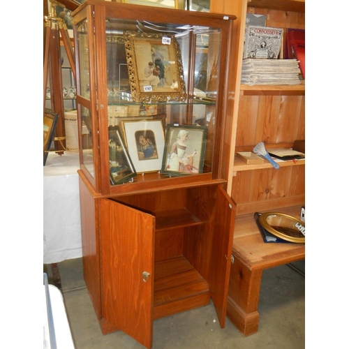 1746 - A single glazed cabinet with 2 door base