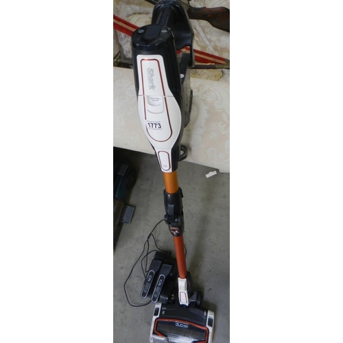 1773 - A Shark vacuum cleaner complete with battery packs