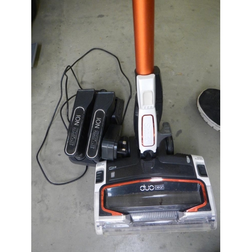 1773 - A Shark vacuum cleaner complete with battery packs