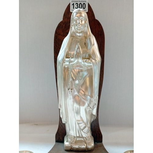 1300 - A silver plated religious candle holder