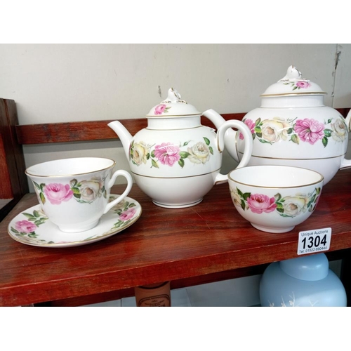 1304 - A Royal Worcester Royal Garden Elgar tea set including teapot, water, 2 duo's & sugar