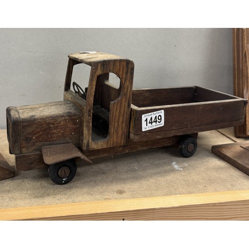 1449 - A wooden lorry and a pair of wooden candleholders.