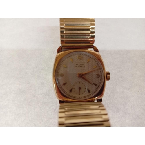 1004 - An Avia 9ct Gent's watch with later gold crowned strap