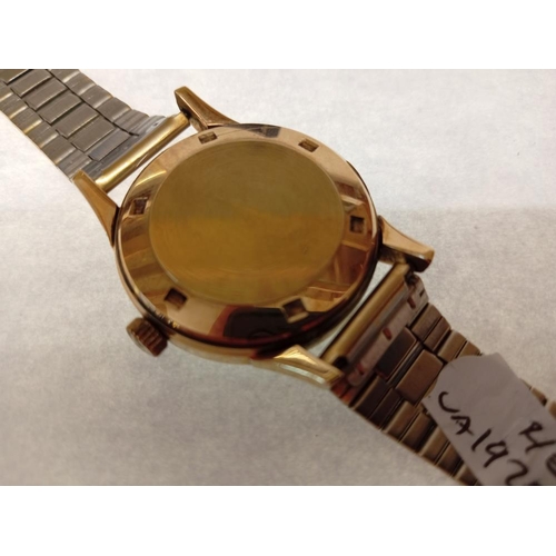 1007 - A gold Garrard automatic date watch with gold coloured strap in Garrard box