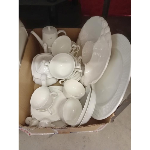 1243 - 2 good boxes of white dinnerware including 2 tureens etc.