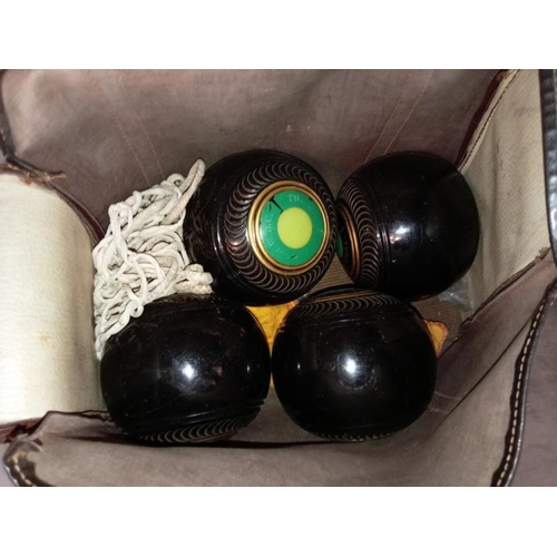 1247 - A set of 4 Tyrolite Taylor & Rolph lawn bowls, Size 5 1/6 Bias 3