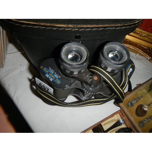 697 - A pair of cased Miranda 10 x 50 binoculars.