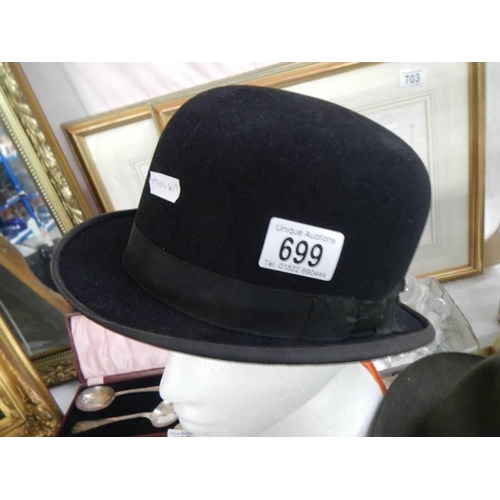 699 - A good quality bowler hat by Christies of London and another hat.