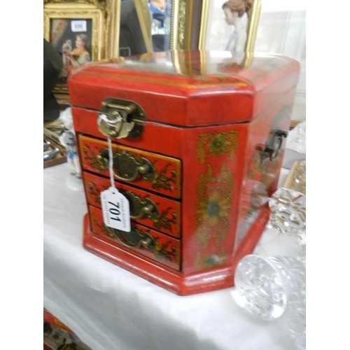 701 - A good quality Japanese style red lacquered jewellery casket.