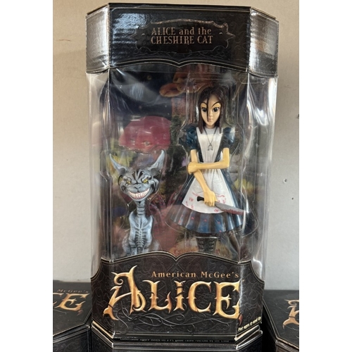 15 - 4 boxed American McGee's Alice in Wonderland figures, including white rabbits, and Alice, as new