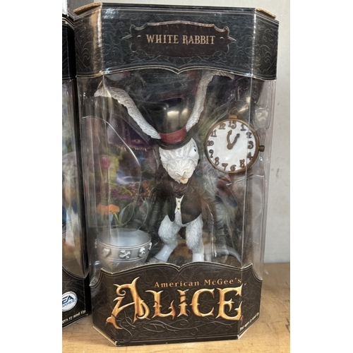 15 - 4 boxed American McGee's Alice in Wonderland figures, including white rabbits, and Alice, as new