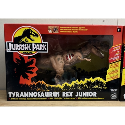 18 - A boxed Jurassic Park ltd edition electronic Stegosaurus and Tyrannosaurus Rex Junior as new