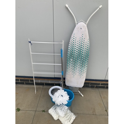 616 - An ironing board, mop with bucket & clothes airer