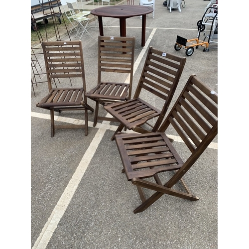 634 - 4 Dark wood folding garden chairs