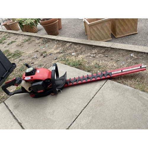 665 - A Greenware GCGJB-25D petrol garden hedge trimmer